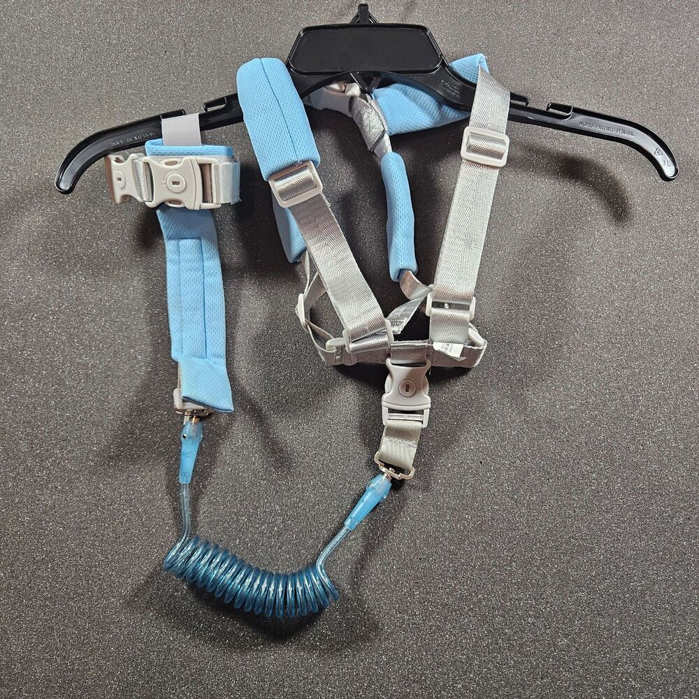 Toddler harness with parent wrist strap